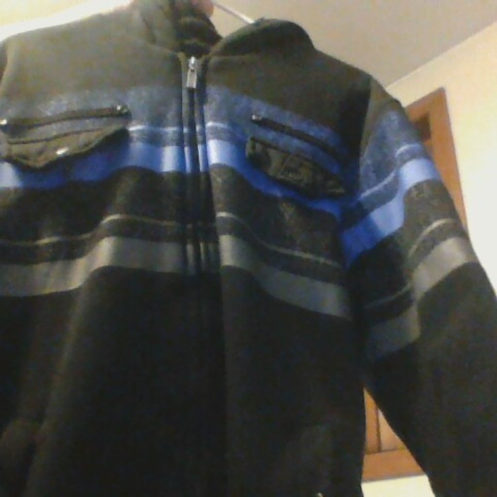 a black grey and blue jacket